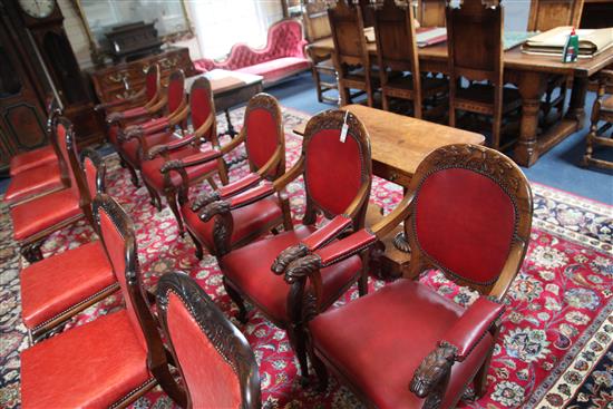 A set of six mid 19th century Anglo Indian carved padouk elbow chairs, W.2ft H.3ft 1in.